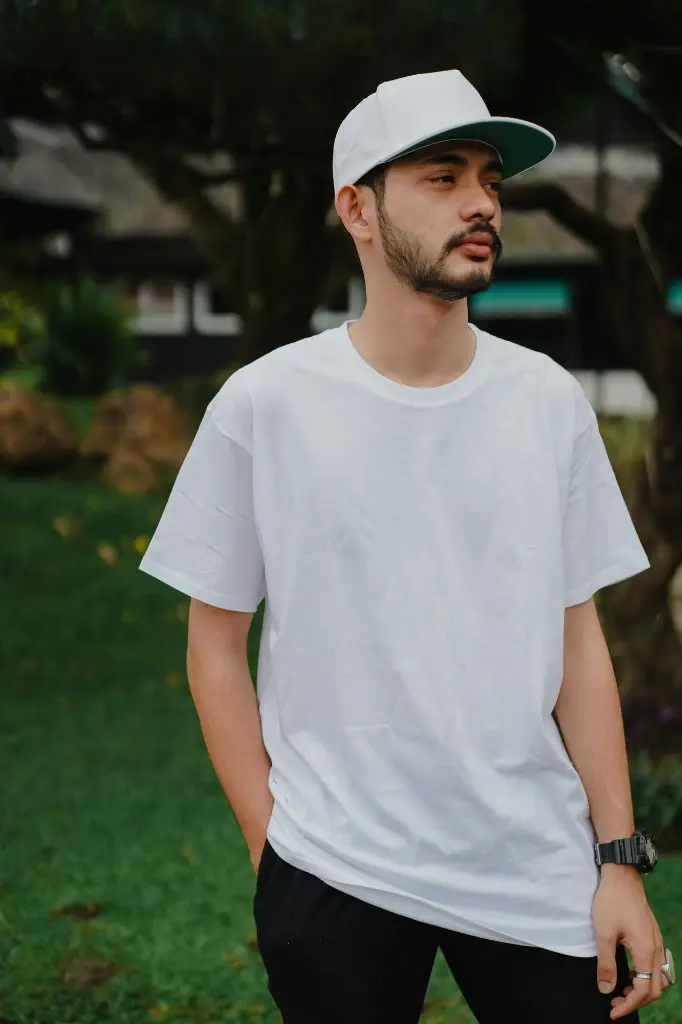 unsplash_ogmenj2NGho_man wearing tshirt.webp